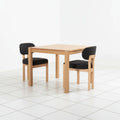 Black fabric seat dining chair detail