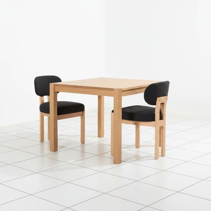 Black fabric seat dining chair detail
