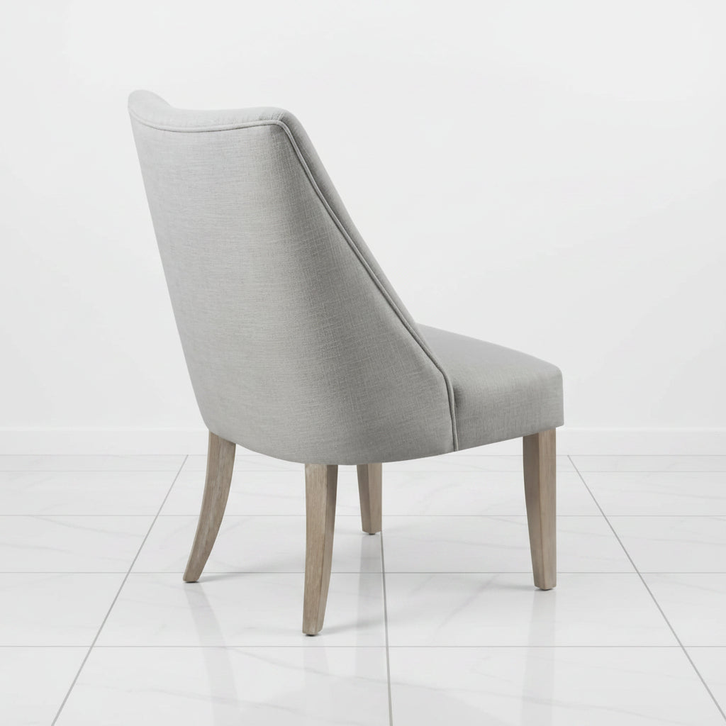 High back light grey dining chair side view