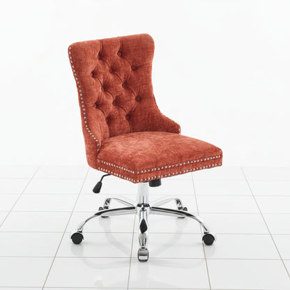 Orange tufted office chair side angle