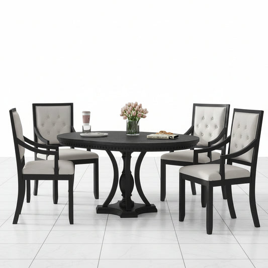 Round dining table with four chairs in black and oak
